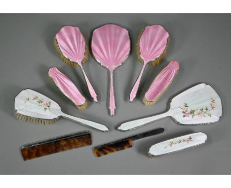 A basse-taille and floral enamelled silver four-piece brush set including hand-mirror and comb (latter not enamelled), Mappin