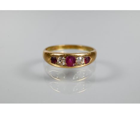 An antique 18ct yellow gold ring set with five graduated alternate set ruby and diamonds, size N, approx 3.2g all in 