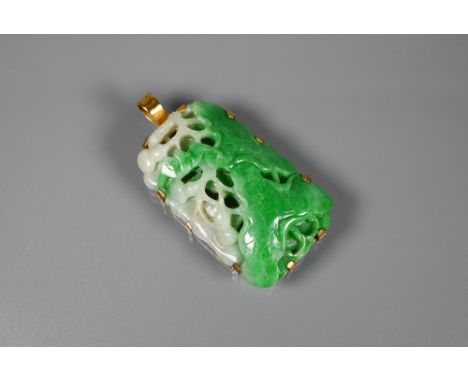 A Chinese jade pendant, the pierced rectangular plaque of moss on snow jade carved with stylised lotus flowers and foliage, o