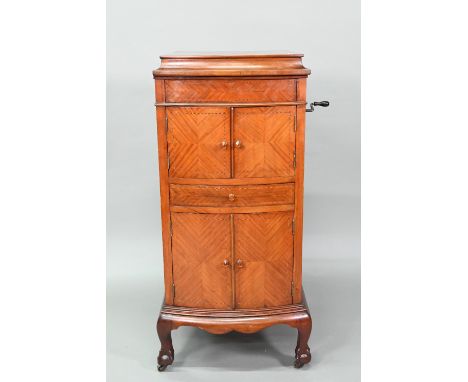 A vintage walnut cased Paragon gramophone, early 20th century c/w a quantity of discs 
