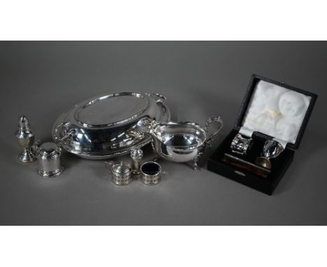 A heavy quality silver drum mustard in the Georgian taste, London 1936, to/w a three-piece condiment set Birmingham 1979, 6oz
