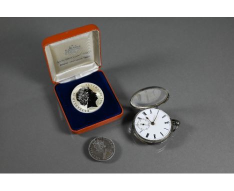 An antique silver pocket watch by John Aitken, a/f and to/with an Australian Govt. 2006 One Dollar silver kangaroo uncirculat