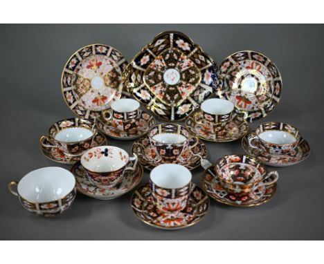 Three Royal Crown Derby Imari trios of tea cup, saucer and plate, to/w five other tea cups and saucers, a large tea cup and a