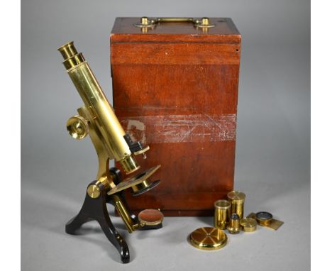 An antique brass binocular microscope by Henry Crouch, London Wall, no 461, in fitted mahogany case with a selection of optic