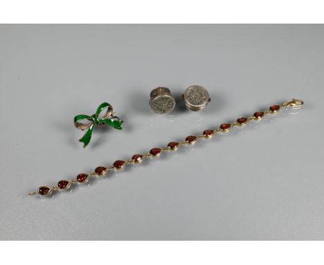 A 9ct yellow gold collet-set tear-shaped garnet bracelet to/w green enamel bow brooch and two white metal lapel buttons 