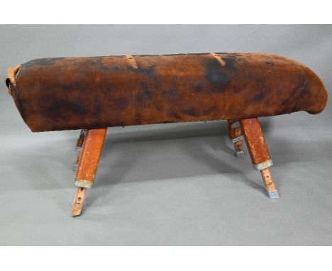 A vintage vault horse, suede covered on adjustable oak legs, approx. 174 cm long 