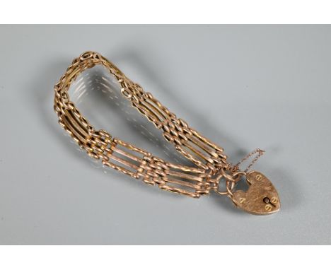 A 9ct rose gold gatelink bracelet with padlock and chain attached, approx 16.3g 