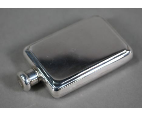 A small silver hip flask with screw-top, Broadway &amp; Co., Birmingham 2005, 3.4oz (apparently unused) 