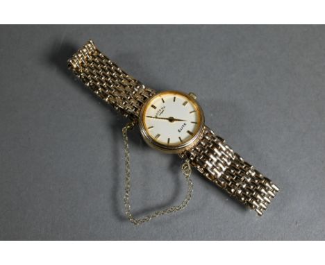 A Rotary Elite 9ct lady's wristwatch, with white dial within a 21 mm dia. case on link strap - 19.6g all-in 