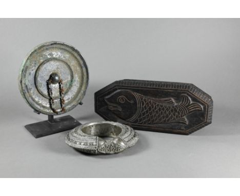 A middle-eastern (probably Yemen) antique low grade silver bangle to/w an antiqued circular metal gong (15 cm diameter) on di