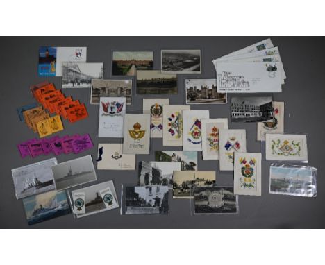 A small selection of postcards of naval and military interest, silks including RAF badge, stamps first day covers, etc (box) 