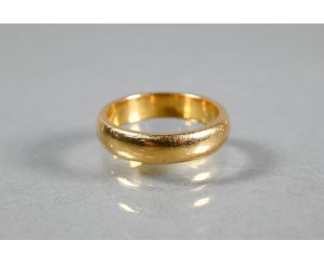 A 22ct yellow gold wedding band, size O 1/2, approx 8.6g 