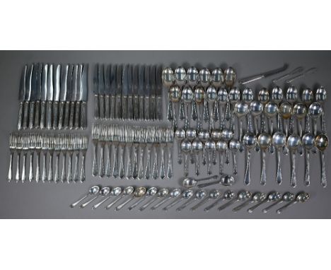 A matched set of Victorian silver fiddle &amp; thread flatware, comprising twelve each table forks and dessert spoons and for