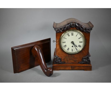 A mid 19th century single fuse mahogany cased English bracket clock, with white enamelled dial and associated wall bracket, 3