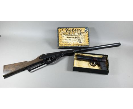 A vintage boxed Webley Scott 'Junior' air pistol to/w a 'Daisy' pop-gun (2)Purchasers must be 18 and over - photo ID will be 