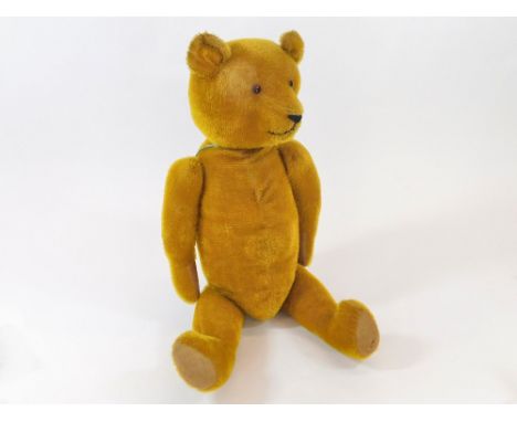 TEDDY BEAR. An English early/mid 20th century plush Teddy bear. Height 62cm.  Please note that all items in this auction are 