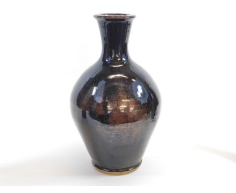 TREVOR CORSER. A large Leach Pottery tenmoku glazed bottle vase by Trevor Corser. Height 39cm. Impressed marks.  Please note 