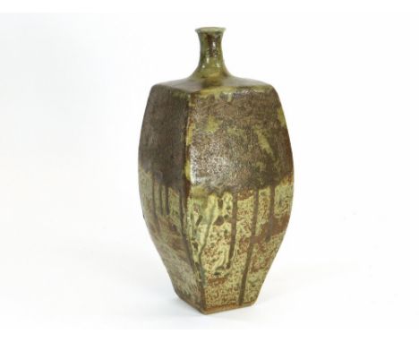 JOANNA WASON. A Leach Pottery cut side ash glaze bottle vase by Joanna Wason. Height 29cm. Impressed Leach & personal mark.  