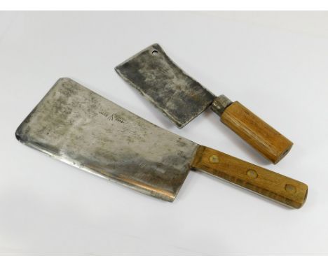 CLEAVERS. A large meat cleaver by Elwell with military broad arrow mark dated 1950. Length 41cm. Also, one other smaller clea