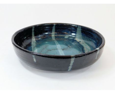TREVOR CORSER. A large shallow bowl by Trevor Corser. Personal & Leach Pottery marks. Diameter 31cm.  Please note that all it
