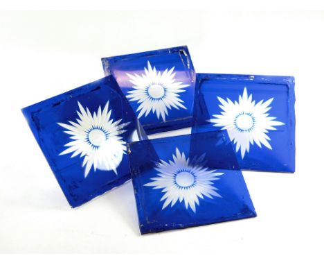 DOOR GLASS. A set of four blue star-cut glass panels.  Each panel is 11 x 11cm.Please note that all items in this auction are