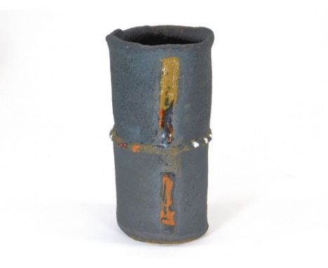 ROBIN WELCH. A cylindrical vase with glaze painted vertical decoration by Robin Welch. Impressed RW initials. Height 20cm.  P