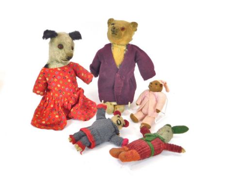 TEDDY BEAR & TOYS. A small English, love-worn, mohair Teddy bear wearing a home-made apron & over coat. Length 30cm. Also, an