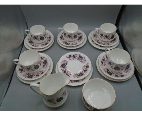 Paragon 'Michelle' part tea set comprising 6 cake plates, 6 saucers, 5 cups, milk jug and sugar bowl