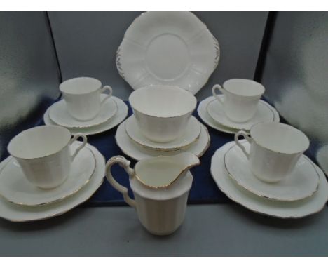 Vintage Paladin Fenton Hughes part tea set, white with gilt edge comprising 1 cake serving plate, 6 cake plates, 6 saucers, 4