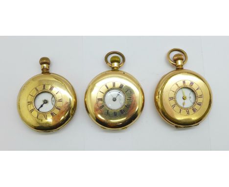 Three gold plated half-hunter pocket watches, including one Waltham Traveler, a/f, one other lacking glass 