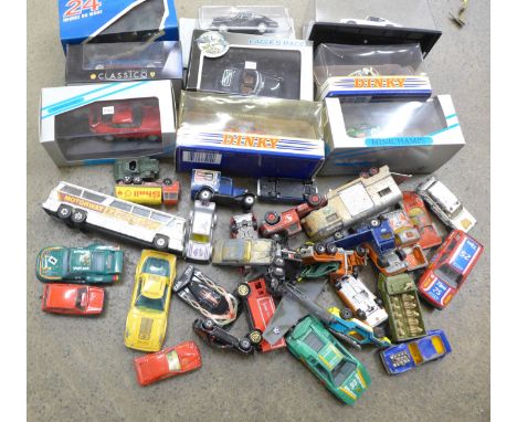 A collection of boxed and loose die-cast model vehicles 