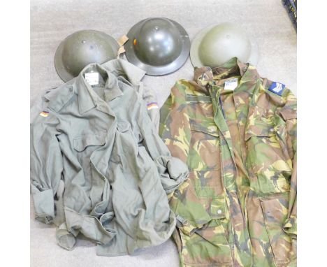 Two British and one Belgian helmet and three Army shirts and jackets