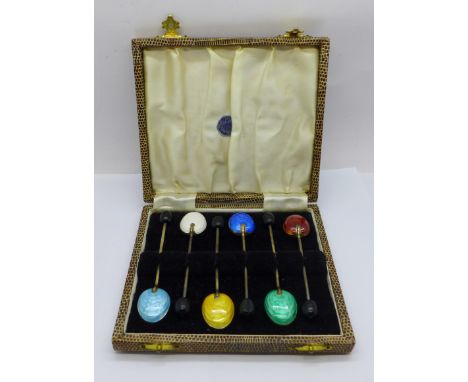 A cased set of six hallmarked silver and enamel coffee bean spoons, enamel a/f on yellow and royal blue spoons 