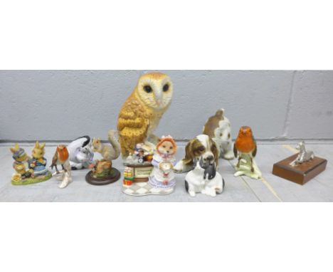 A collection of animal figures including an owl and a Royal Doulton squirrel and two Goebel owls **PLEASE NOTE THIS LOT IS NO