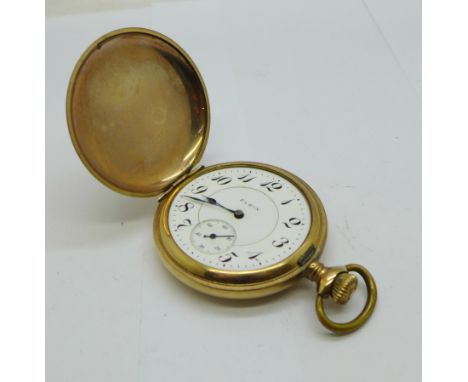 An Elgin gold plated full hunter pocket watch, lacking glass, inner case scratched 