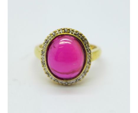 A silver gilt and synthetic cabochon ruby ring, O 