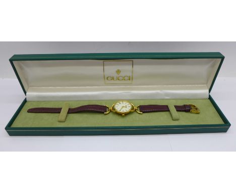 A lady's Gucci wristwatch, 6000 2.L model, boxed 