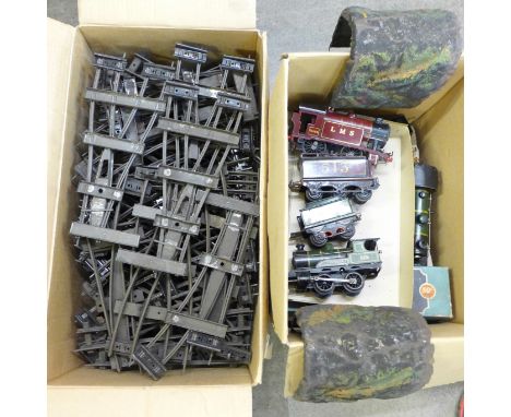 O gauge model rail, three locomotives, five carriages, twelve wagons, track, buffers, tunnel, etc. 