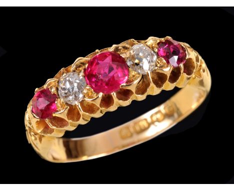 A Ruby and Diamond five stone Ring, pavé-set three graduated round rubies interspersed with two old-cut diamonds in 18ct gold