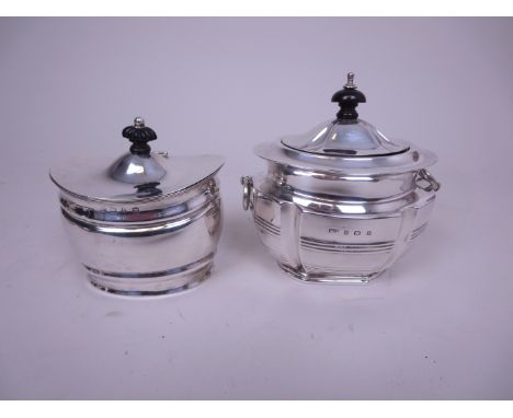 An Edward VII silver Tea Caddy with ribbed friezes and ring handles, Birmingham 1902, and another similar, Birmingham 1893