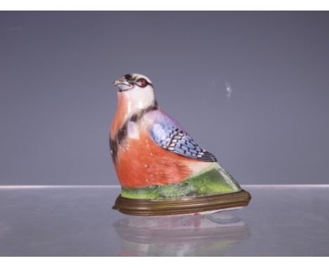 A Battersea mid 18th Century enamelled Snuff Box or Bonbonniere in the form of a Jay, the hinged lid with painted scene of cl