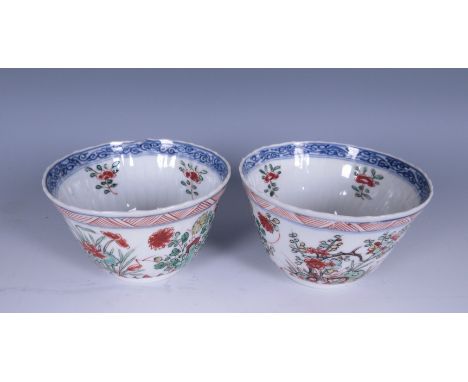 A near pair of Chinese Wucai porcelain Bowls painted birds and flowering shrubs in iron red, green, yellow, etc, 4in diam, sl