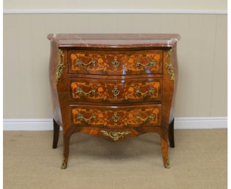 A Louis XV style marquetry Commode with red veined marble top above three serpentine shape drawers with floral and scroll inl