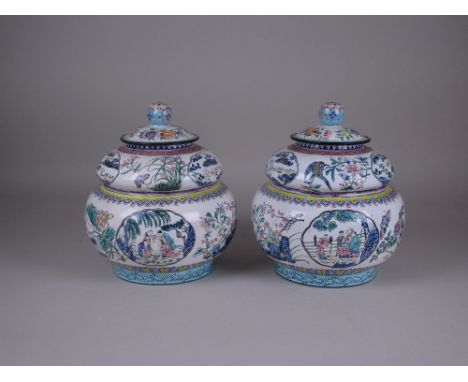 A pair of Canton enamel double lobed Jars decorated with oval vignettes of figures and landscapes, flowers, birds and insects