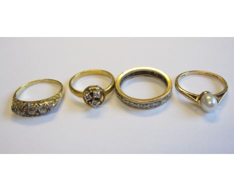 A Diamond Eternity Ring, ring size J 1/2 - K, a Diamond five stone Ring claw-set graduated old-cut stones in 18ct gold, ring 