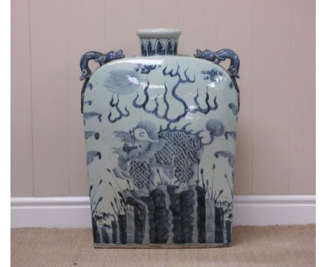 A Chinese blue and white large oblong Flask with narrow neck and double salamander handles, decorated with a Dog of Fo to eac