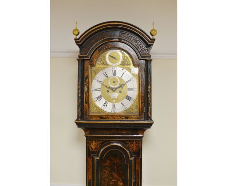 A Georgian Longcase Clock with 8-day movement, brass arched dial with date dial within a chinoiserie lacquered case with bras