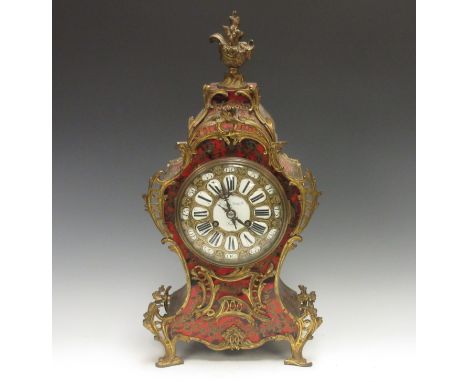 A 19th Century Louis XV style Boulle Mantel Clock with tortoiseshell and brass inlaid case and circular dial with black and w