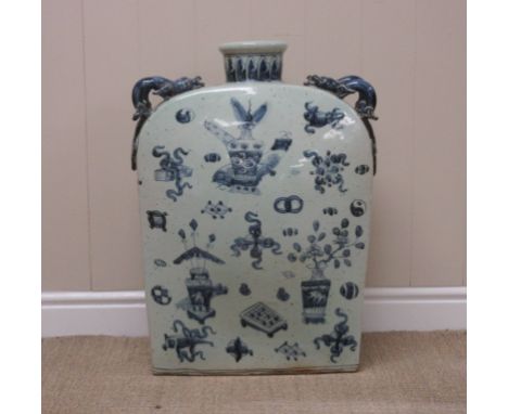 A Chinese blue and white large oblong Flask with narrow neck and double salamander handles decorated with vases of flowers, 2