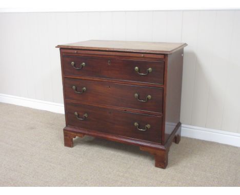 A Georgian mahogany Chest with brushing slide above three long drawers on bracket feet, 2ft 9in